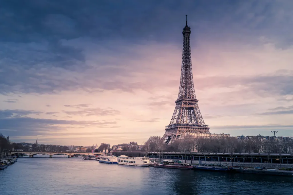 The Eiffel Tower in Paris seen from the Seinne river, representing a popular jogging path for airline crew.