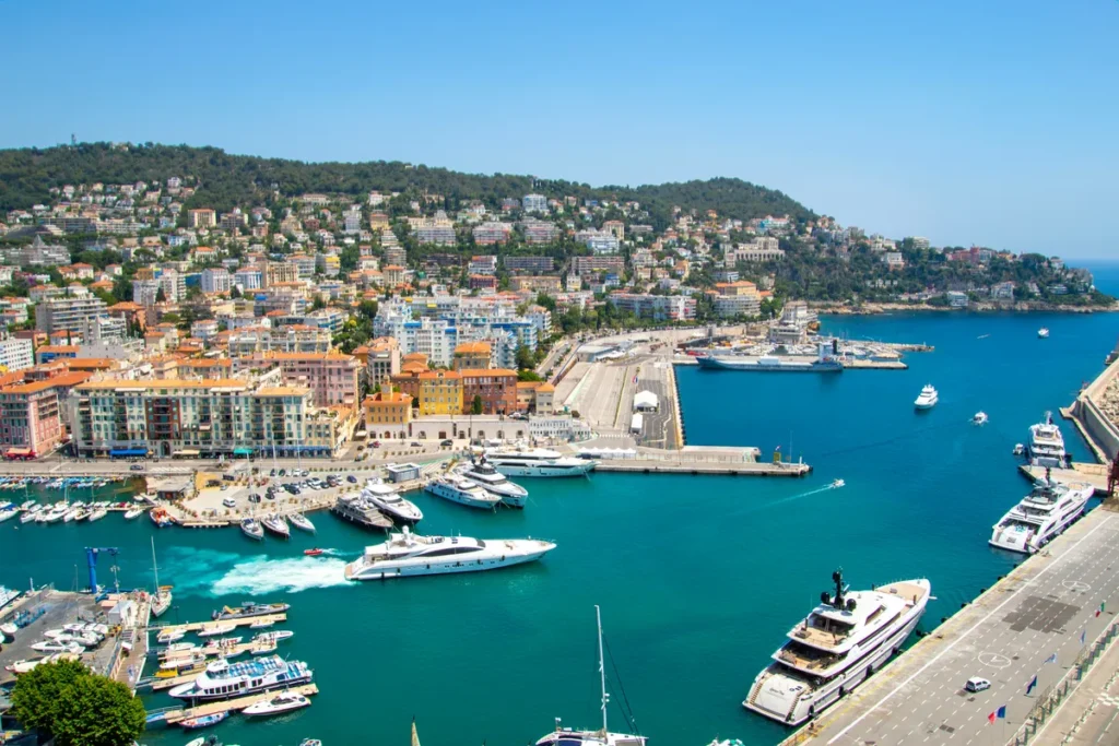 The harbour of Nice with some small boats in the foreground as a symbol for a good running route at Nice, France.