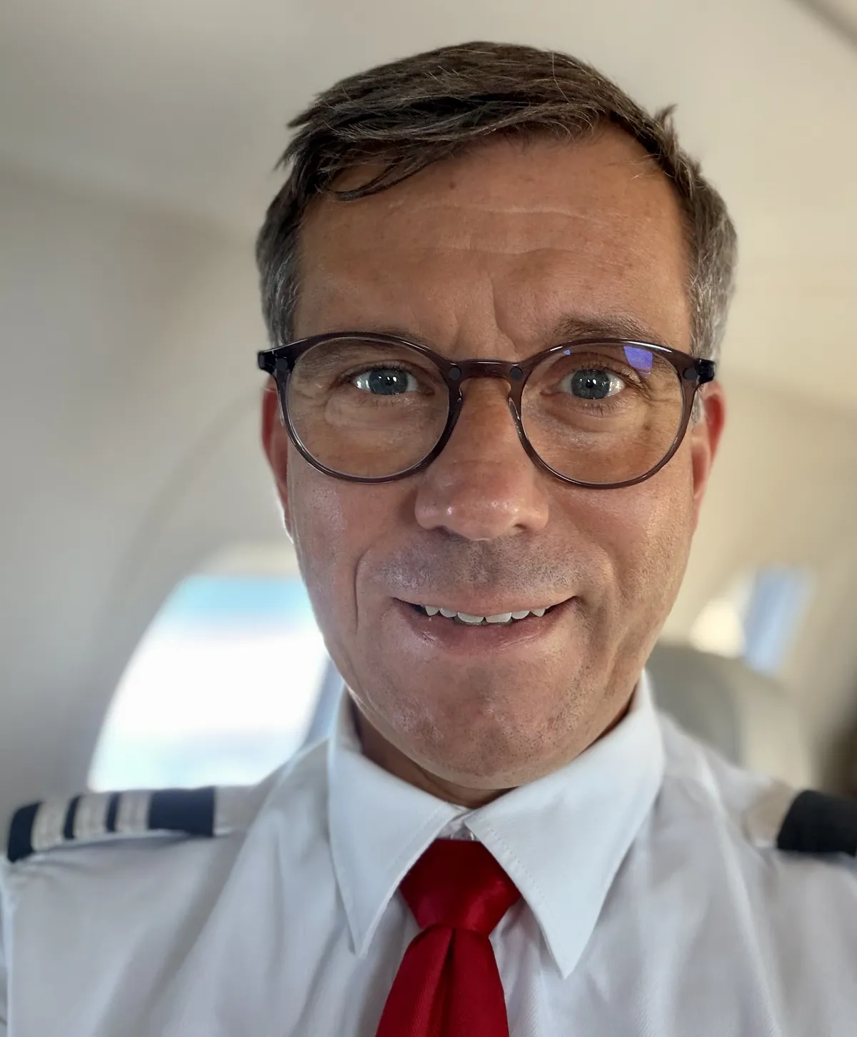 Alex, Founder of BaseLegs, in pilot uniform.